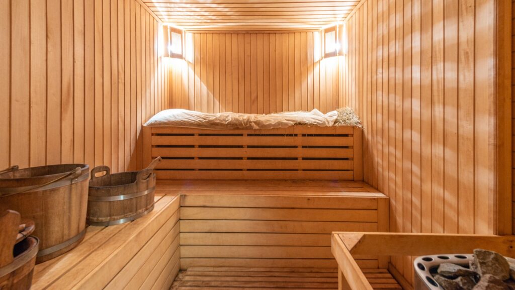 peaceful sauna room highlighting how regular sessions may support recovery