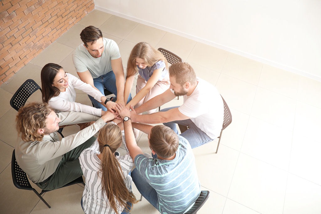 group receiving support from their recovery network