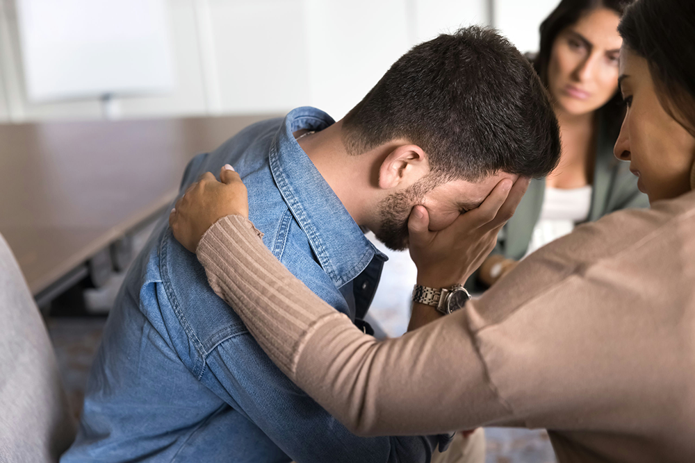 Family in a therapy session working together to break the cycle of addiction.