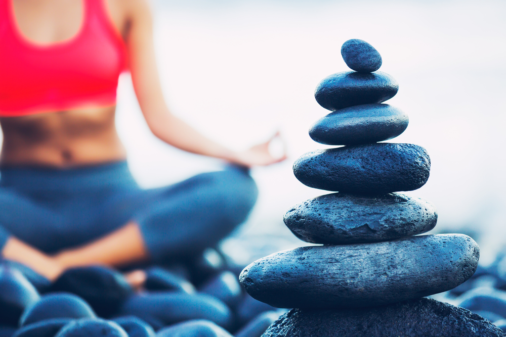 a girl practicing meditation as part of dual diagnosis treatment
